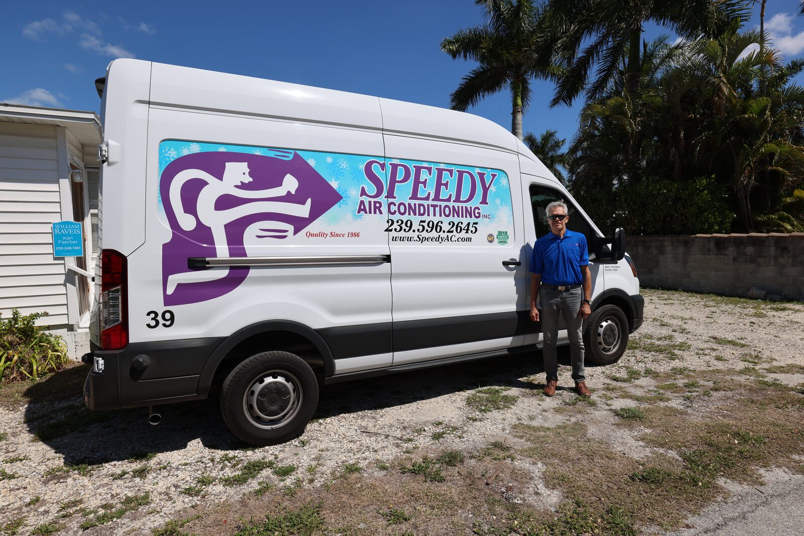 Ready for the next call on a palm-lined Naples street